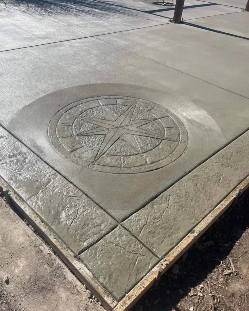 Wet stamped compass rose detail being finished