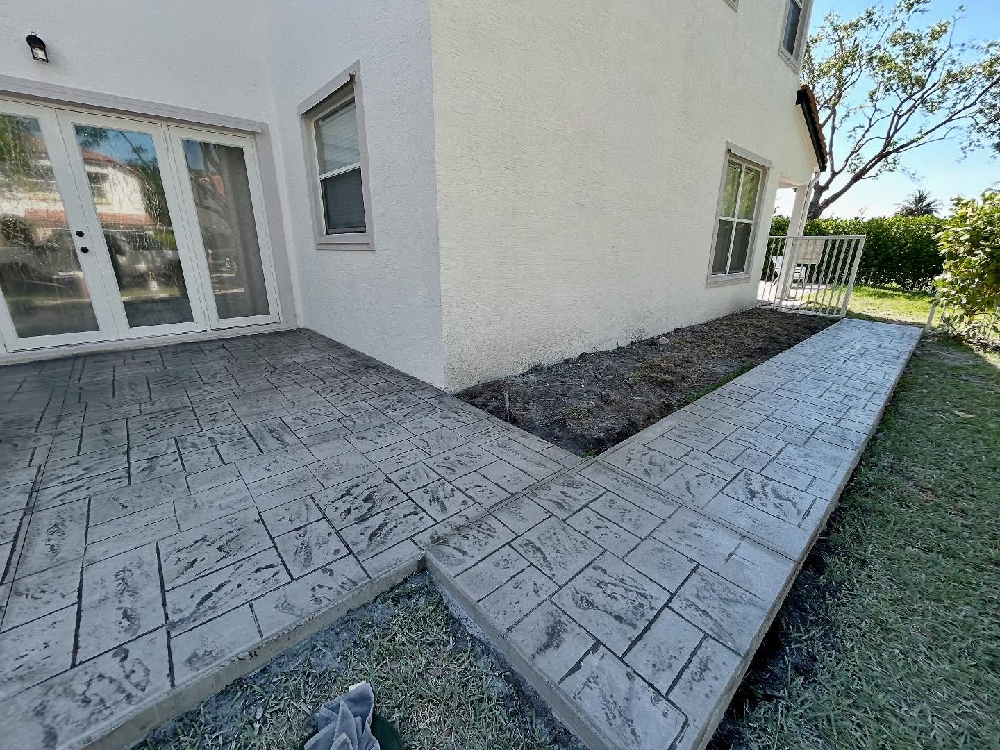 Stamped concrete patio and side walkway